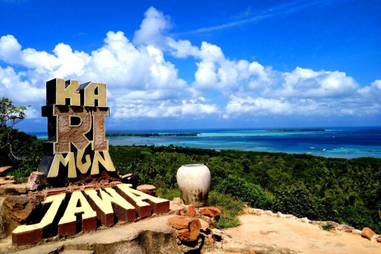 Bukit Love (Love Hill) viewpoint in Karimunjawa with the LOVE sign overlooking the coastline